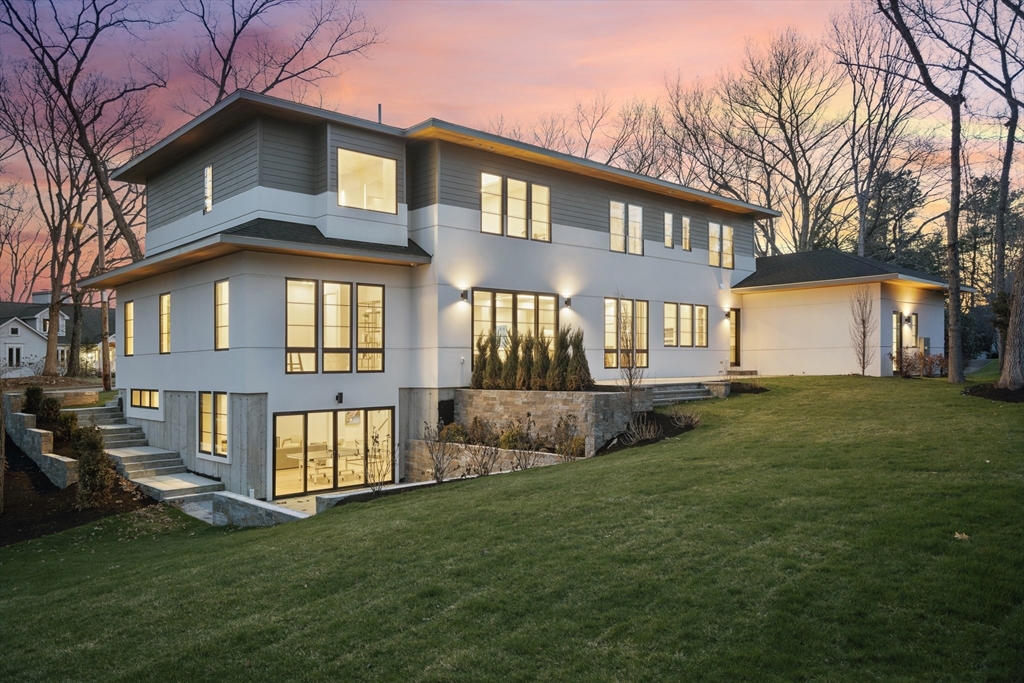 9 Bellevue Road Wellesley, MA 02481 - Photo 37 of 38 a front view of a house with a garden