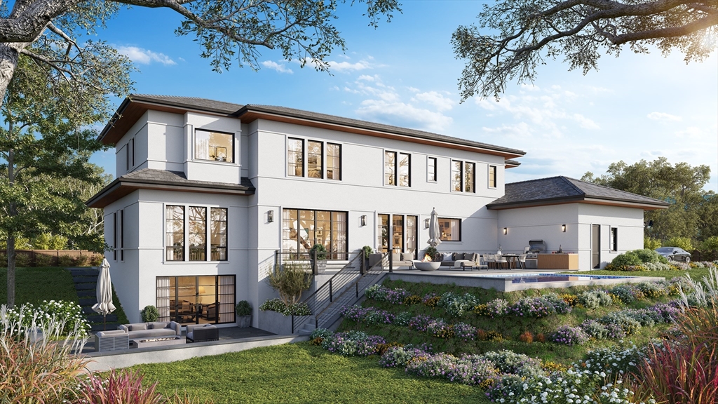 9 Bellevue Road Wellesley, MA 02481 - Photo 38 of 38 a front view of a house with a yard table and chairs