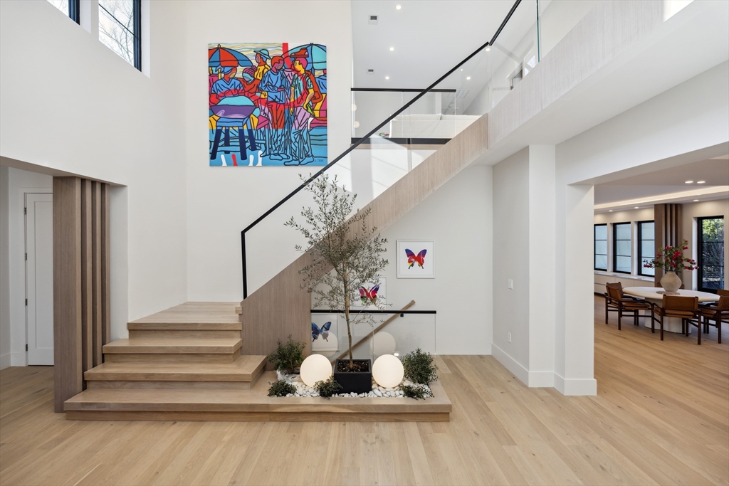 9 Bellevue Road Wellesley, MA 02481 - Photo 4 of 38 a view of entryway and hall with wooden floor