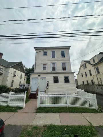 a view of a porch with a bench