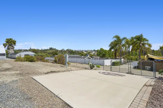 an aerial view of residential building with parking space