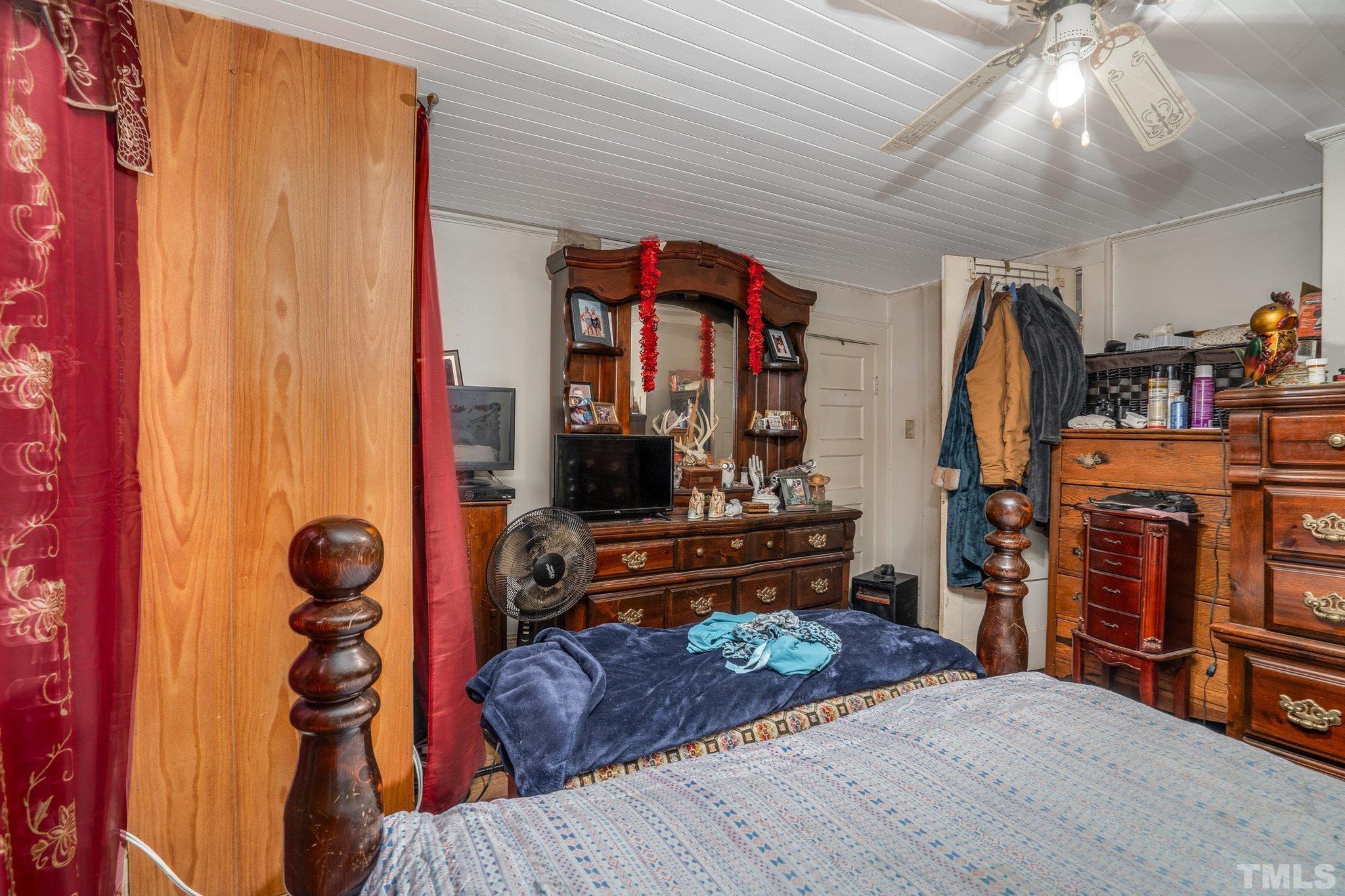 1724 Old Us 64 Spring Spring Hope, NC 27882 - Photo 11 of 23 a bedroom with furniture and a window