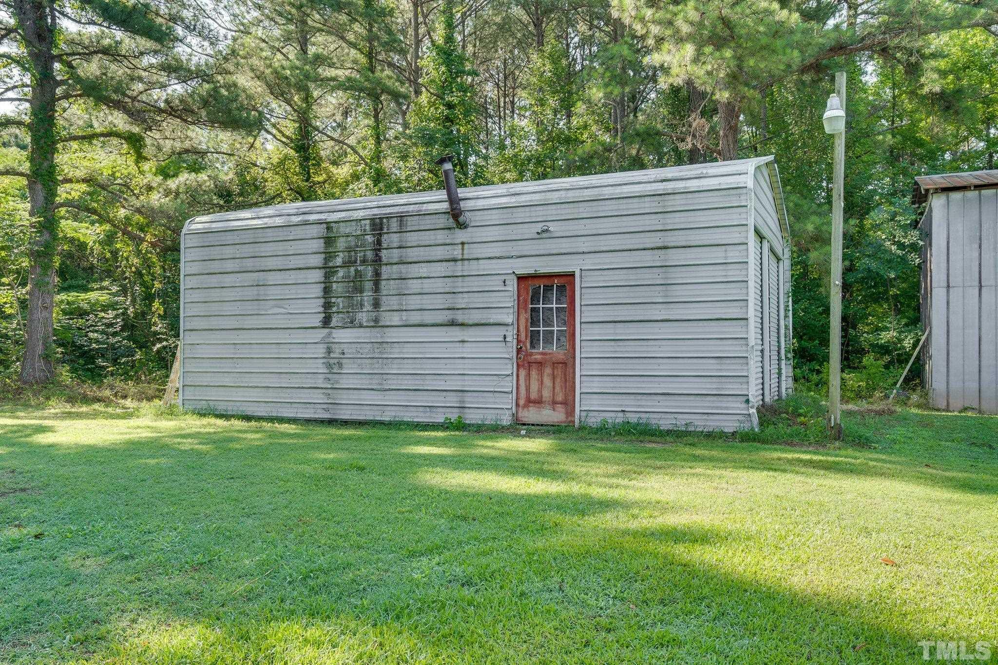 1724 Old Us 64 Spring Spring Hope, NC 27882 - Photo 18 of 23 a view of a backyard of the house