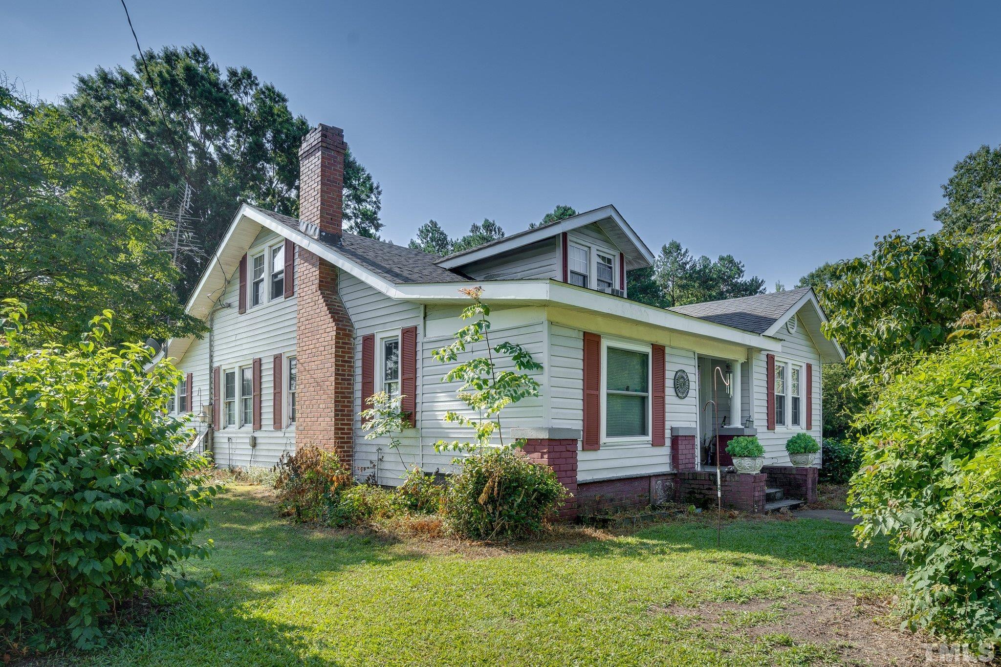 1724 Old Us 64 Spring Spring Hope, NC 27882 - Photo 2 of 23 a front view of a house with a yard