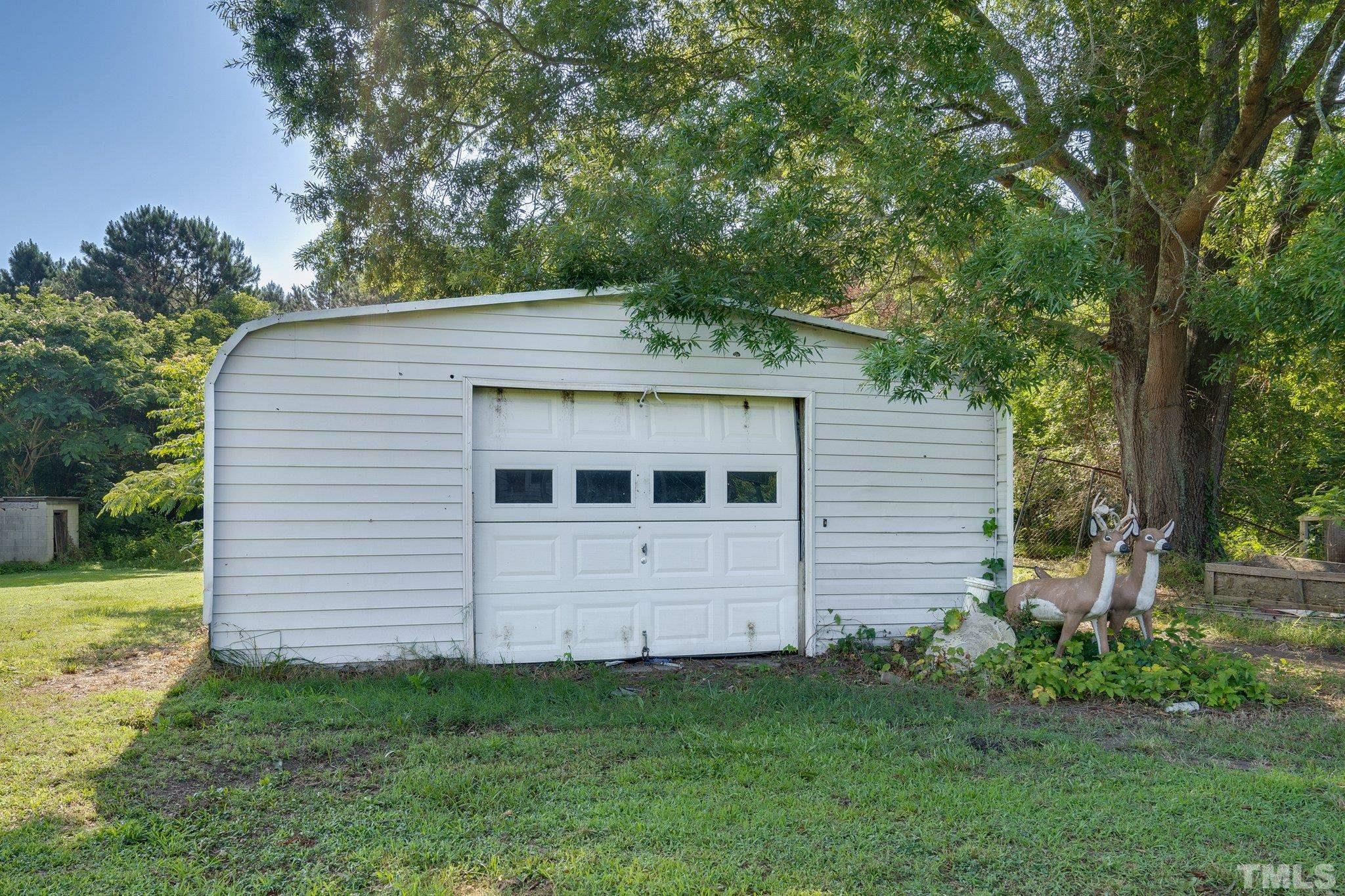 1724 Old Us 64 Spring Spring Hope, NC 27882 - Photo 23 of 23 a view of a house with a backyard