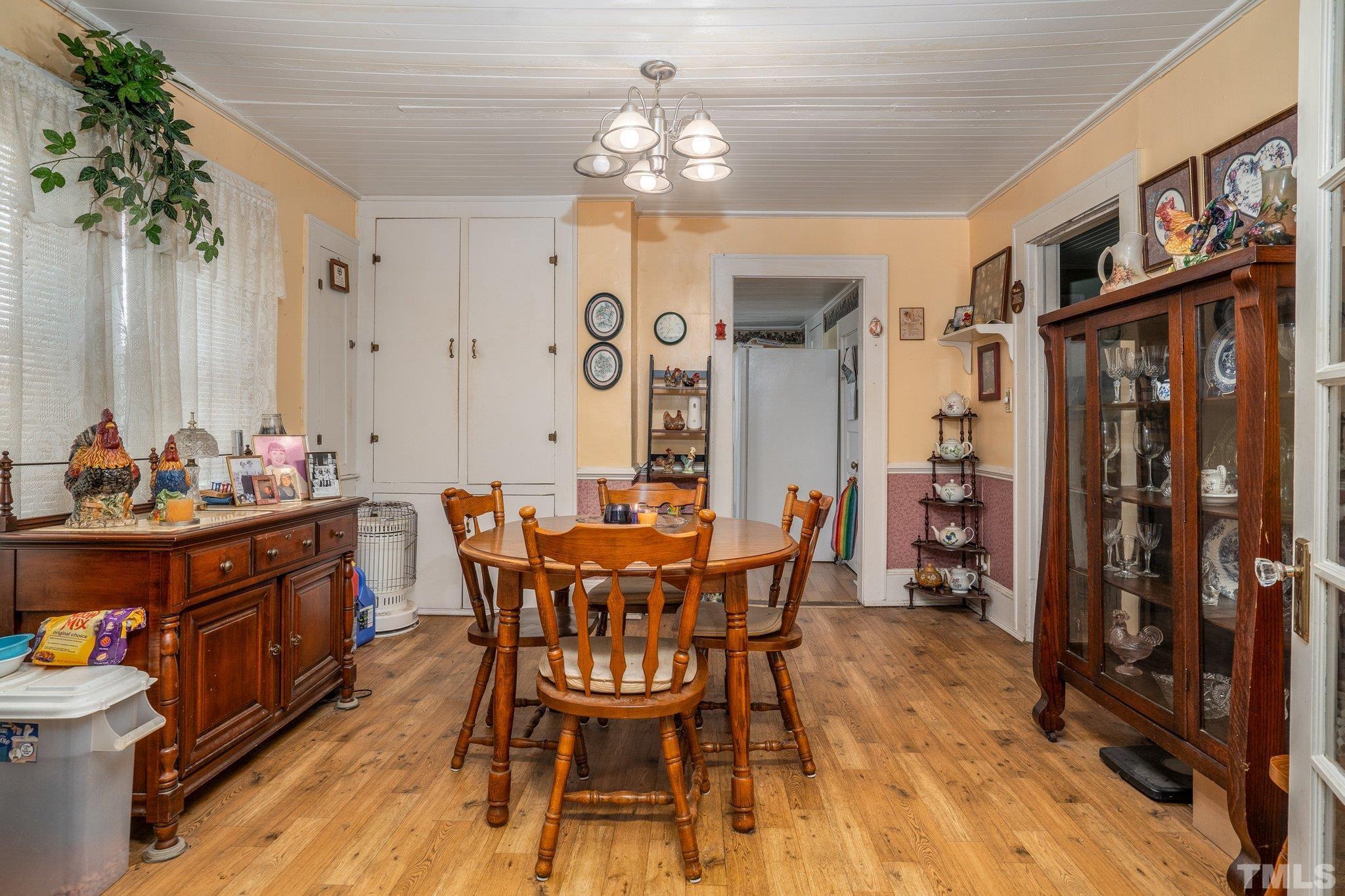 1724 Old Us 64 Spring Spring Hope, NC 27882 - Photo 6 of 23 a view of a dining room with furniture and chandelier