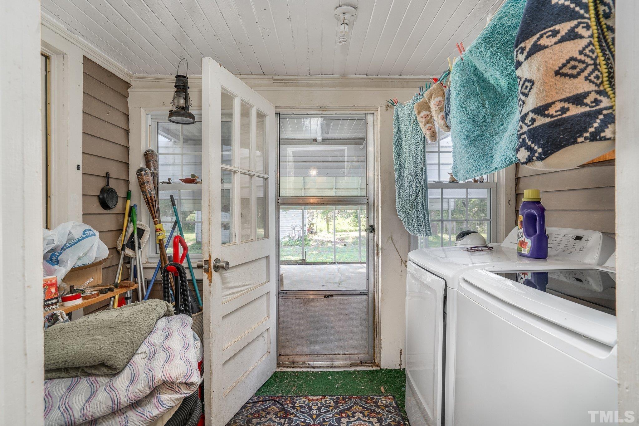 1724 Old Us 64 Spring Spring Hope, NC 27882 - Photo 10 of 23 a storage room with washer and dryer