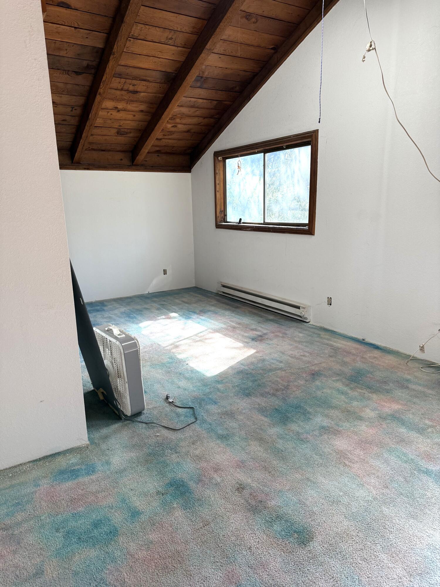 765 Lone Mountain Road O'Brien, OR 97534 - Photo 11 of 16 This is the other end of largest room updstairs bedroom.