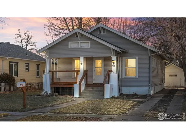 a black and white photo of a house