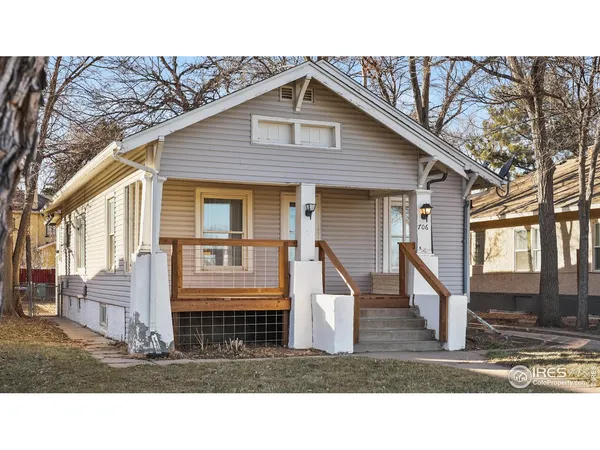 a black and white photo of a house