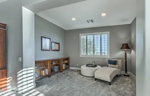 a bedroom with furniture