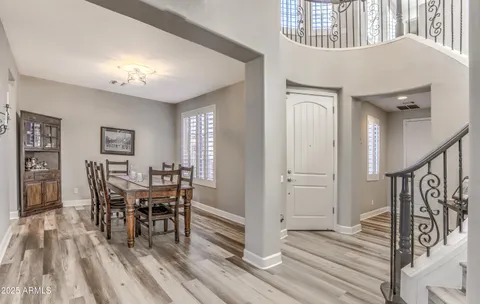 a view of a livingroom with furniture and wooden floor