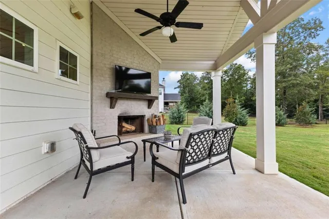 a view of a patio with a chairs and a table