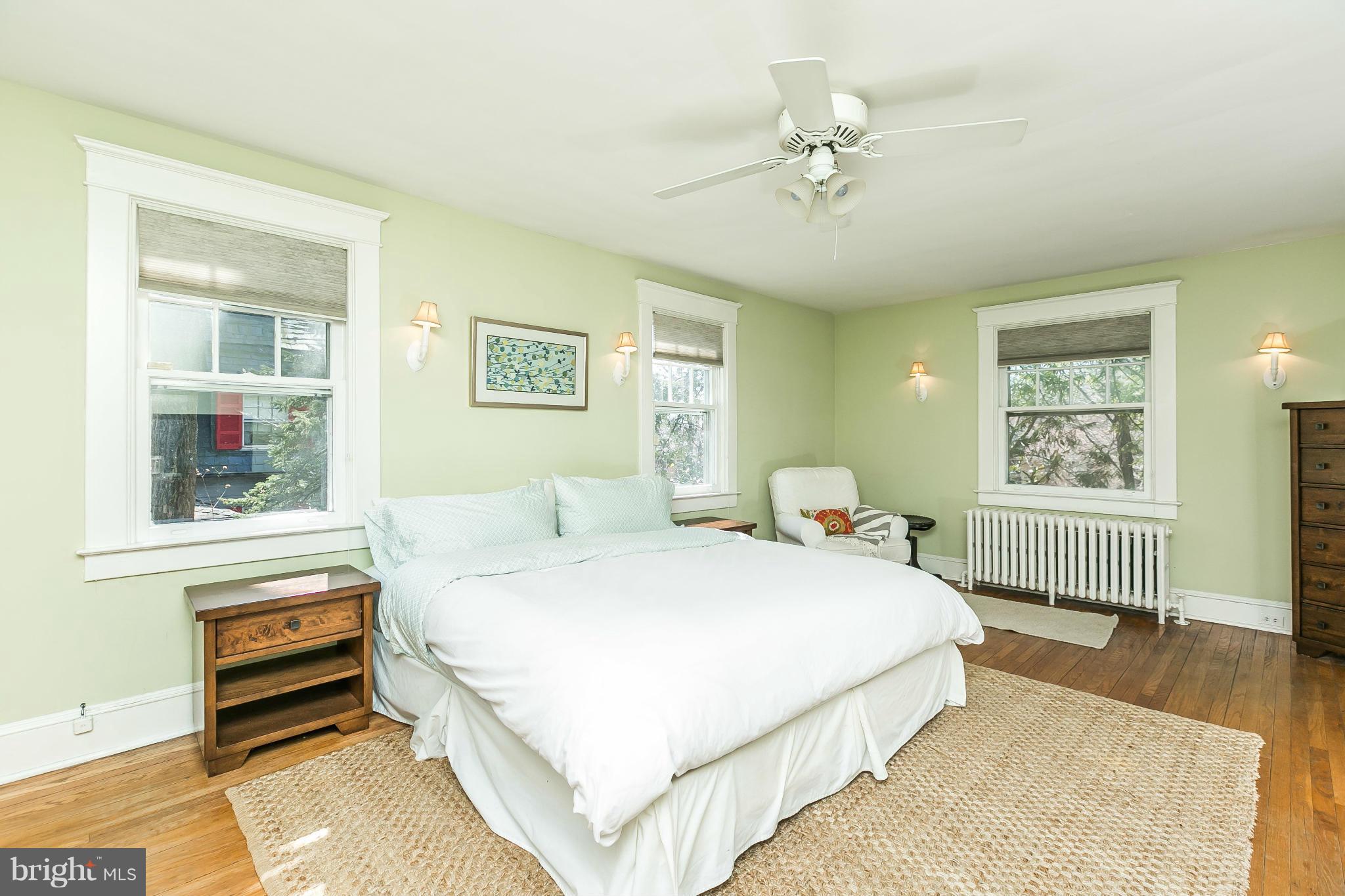 5007 Falls Rd Terrace Baltimore, MD 21210 - Photo 20 of 30 a bedroom with a bed dresser and a window