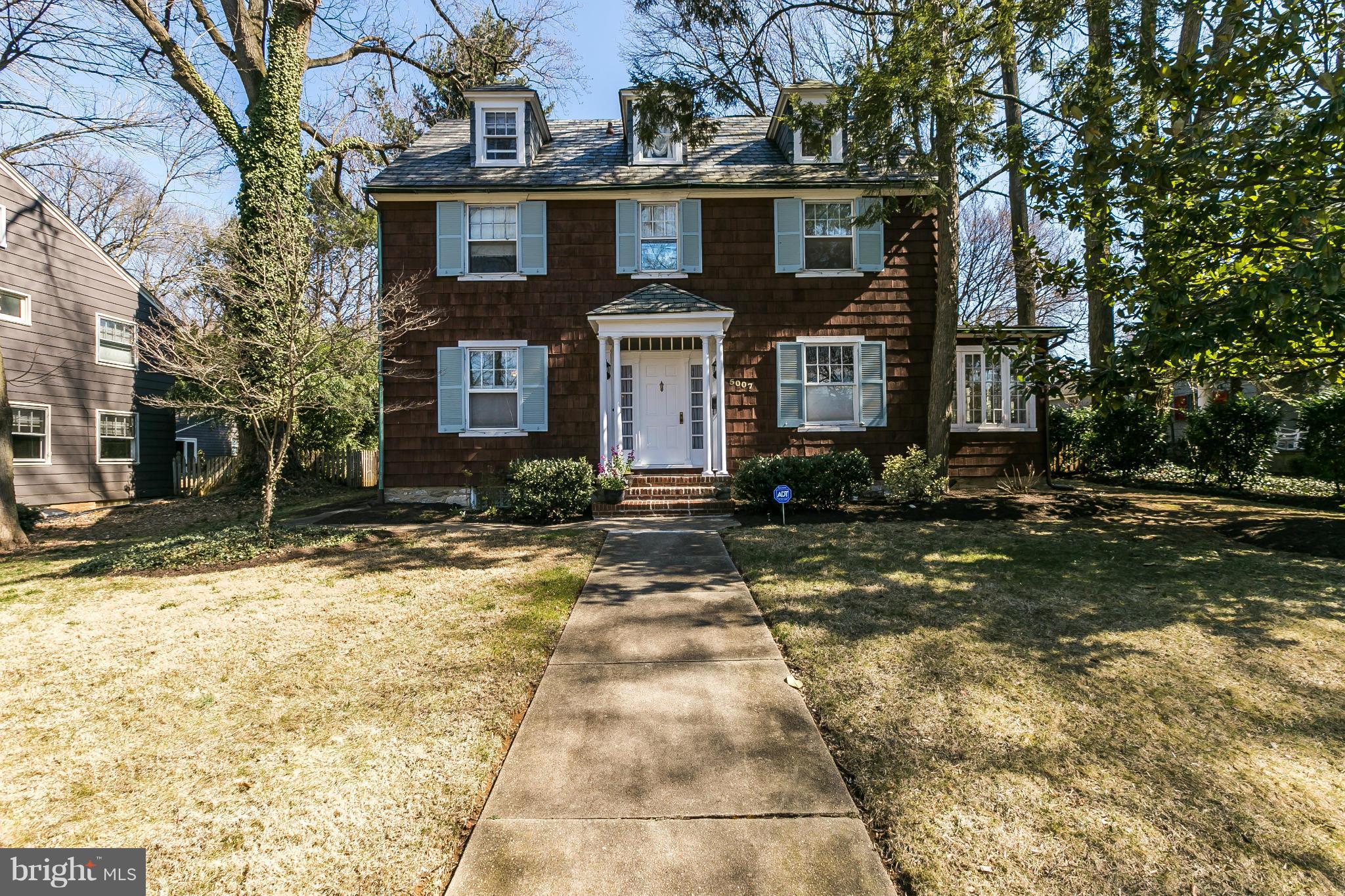 5007 Falls Rd Terrace Baltimore, MD 21210 - Photo 4 of 30 a front view of a house with a yard