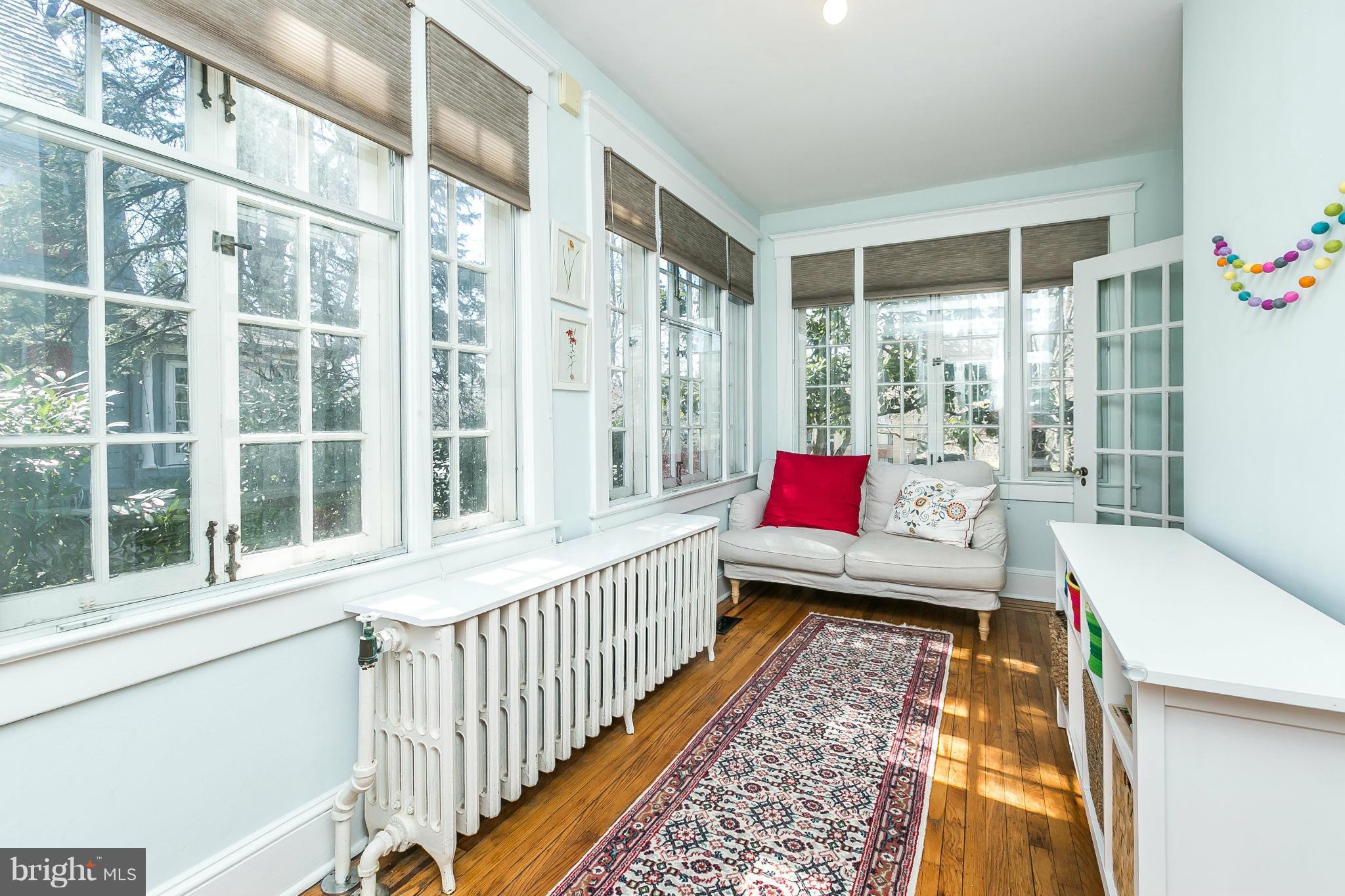5007 Falls Rd Terrace Baltimore, MD 21210 - Photo 8 of 30 a living room with a large window