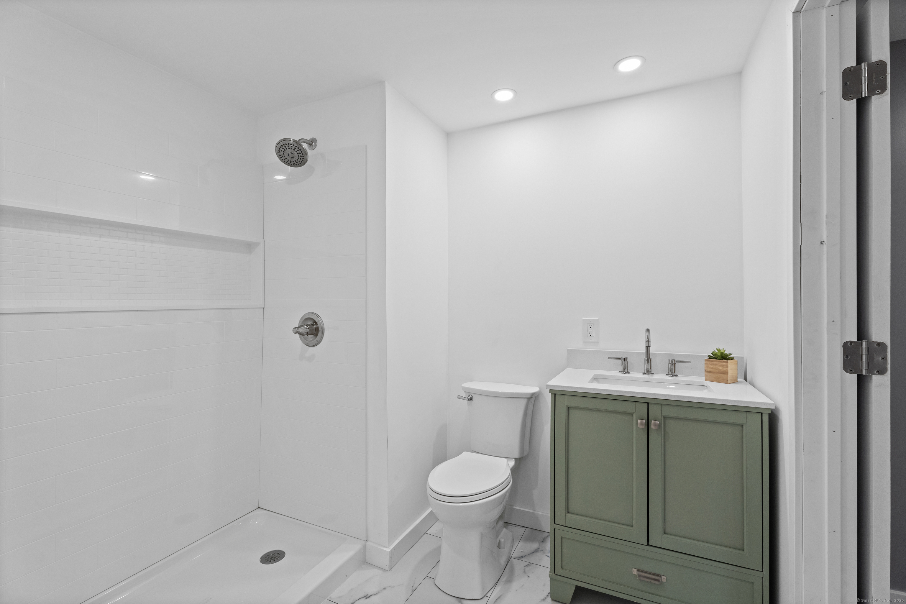 80 Sheldon Road Griswold, CT 06351 - Photo 13 of 24 a bathroom with a toilet a sink and shower