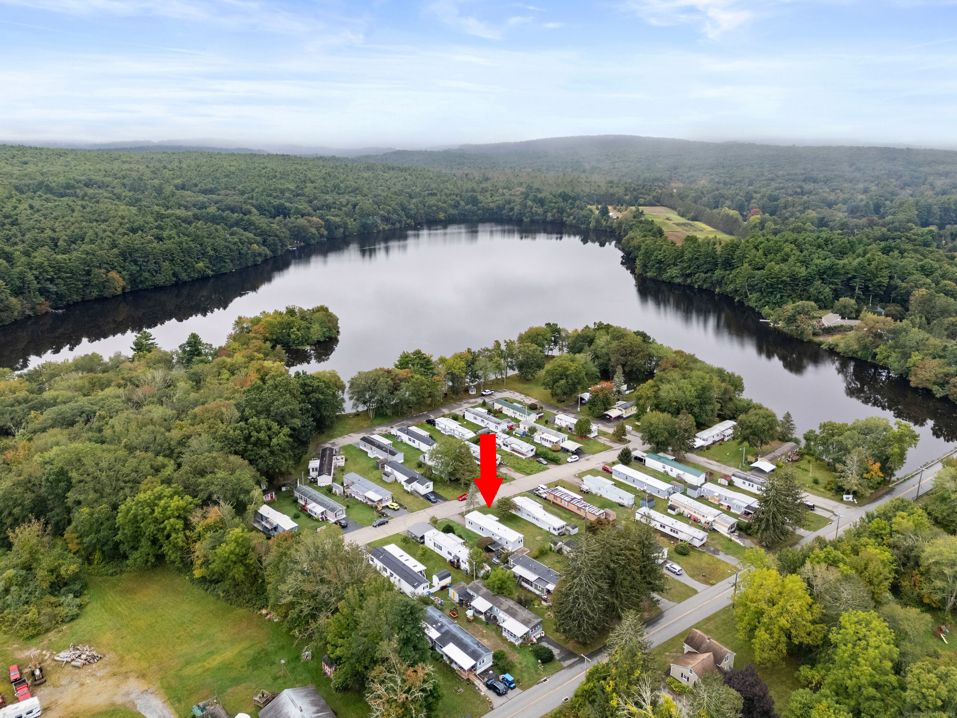 80 Sheldon Road Griswold, CT 06351 - Photo 2 of 24 an aerial view of lake residential house with outdoor space and trees around