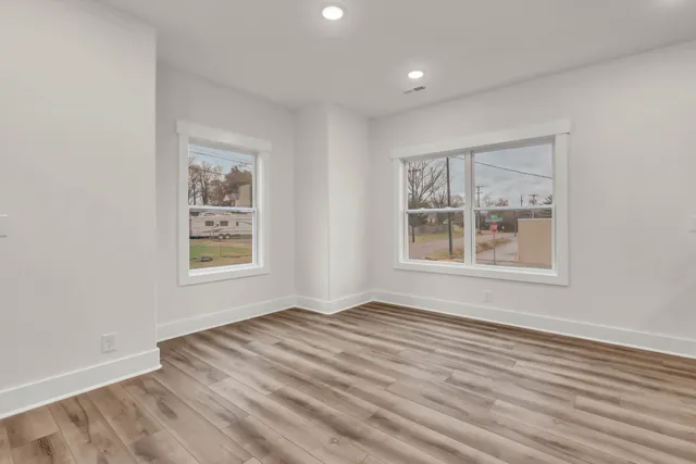 a front view of a house with yard