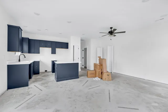 a view of a livingroom with furniture