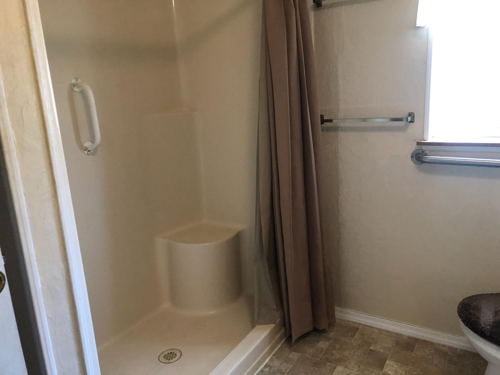 22325 Brent Road Red Bluff, CA 96080 - Photo 12 of 36 a bathroom with a glass door shower
