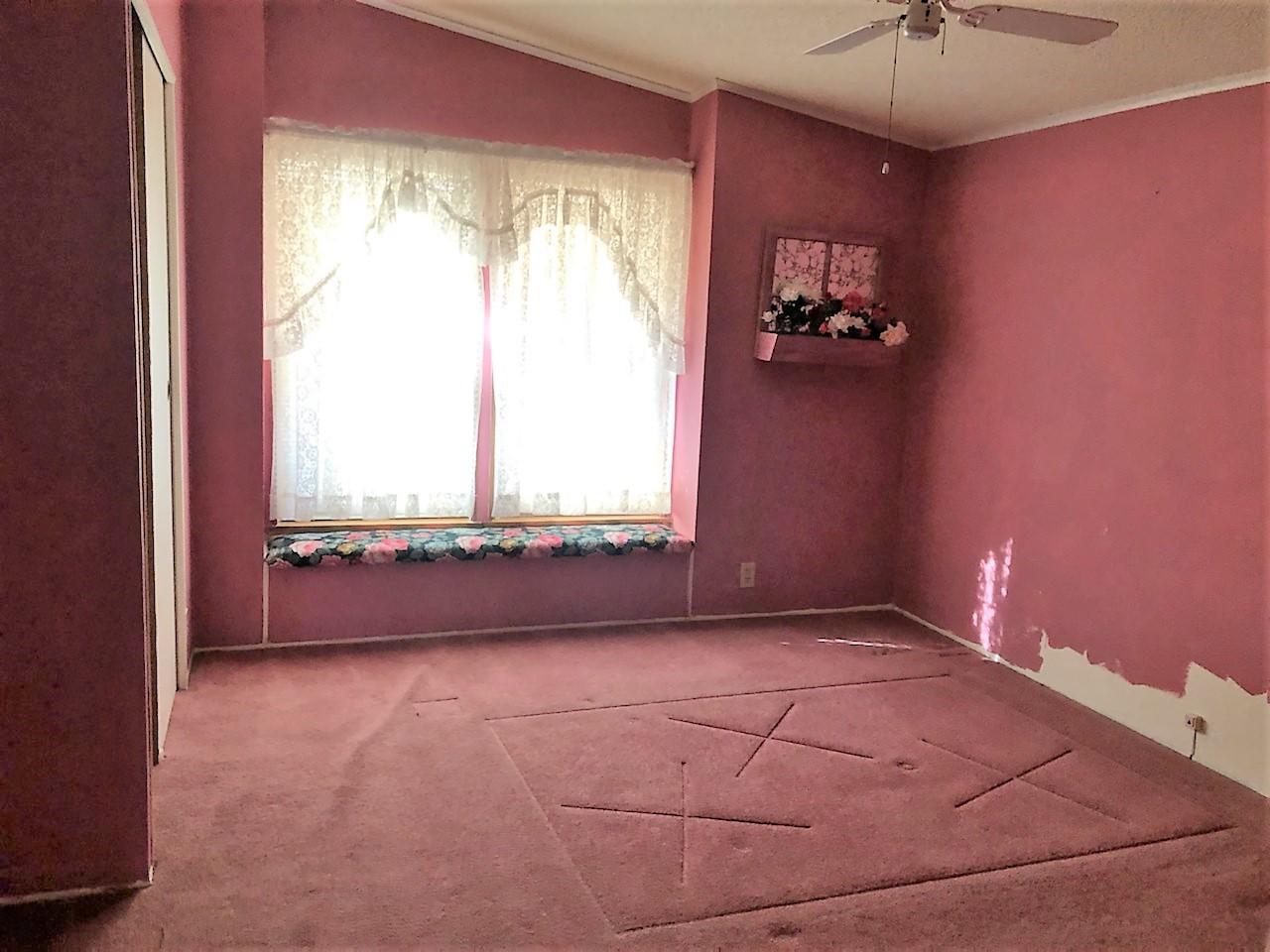 22325 Brent Road Red Bluff, CA 96080 - Photo 16 of 36 a view of an empty room with a window