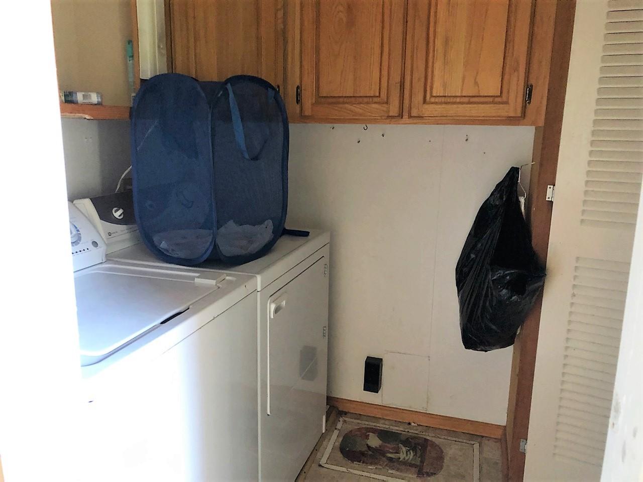 22325 Brent Road Red Bluff, CA 96080 - Photo 17 of 36 a kitchen with a refrigerator and a stove
