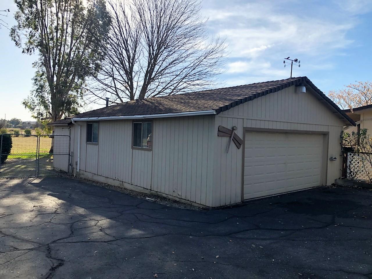 22325 Brent Road Red Bluff, CA 96080 - Photo 21 of 36 a view of a house with a yard