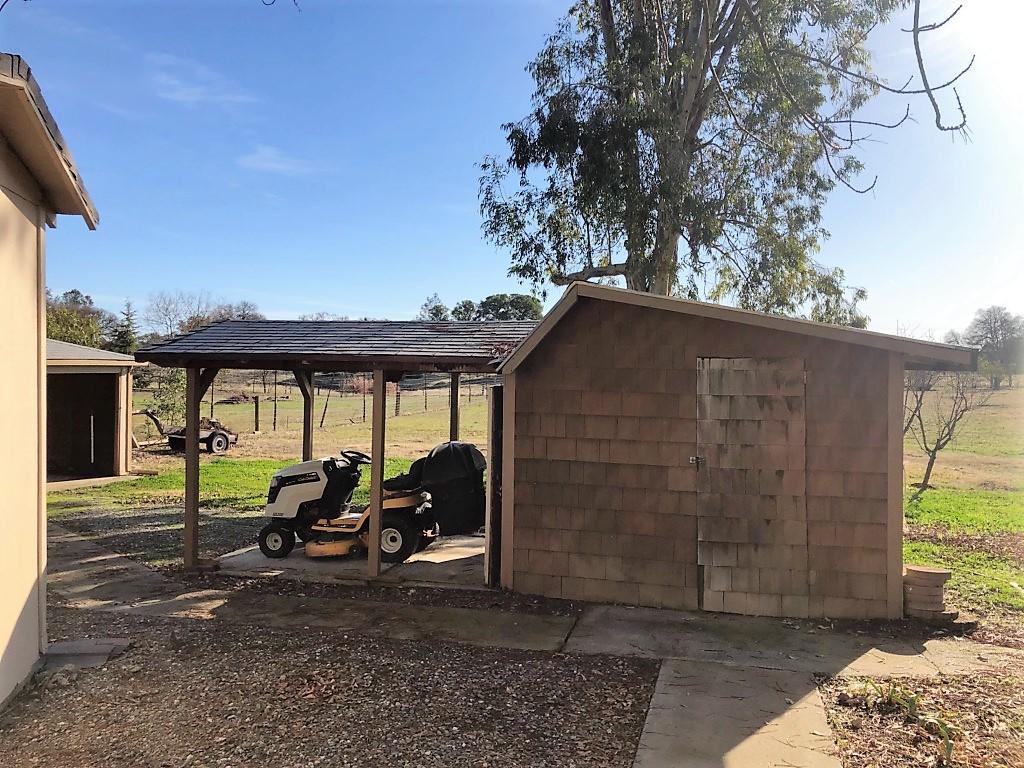 22325 Brent Road Red Bluff, CA 96080 - Photo 26 of 36 a front view of a house with garden