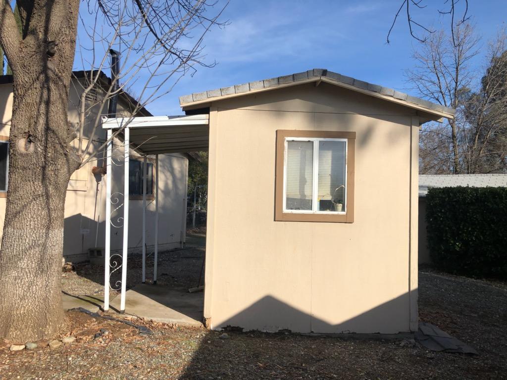 22325 Brent Road Red Bluff, CA 96080 - Photo 27 of 36 a front view of a house with a yard