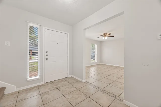 a view of an empty room and window