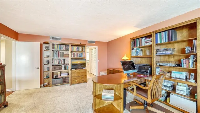 a view of a workspace with furniture and toys