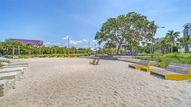 a view of swimming pool outdoor seating and mountain