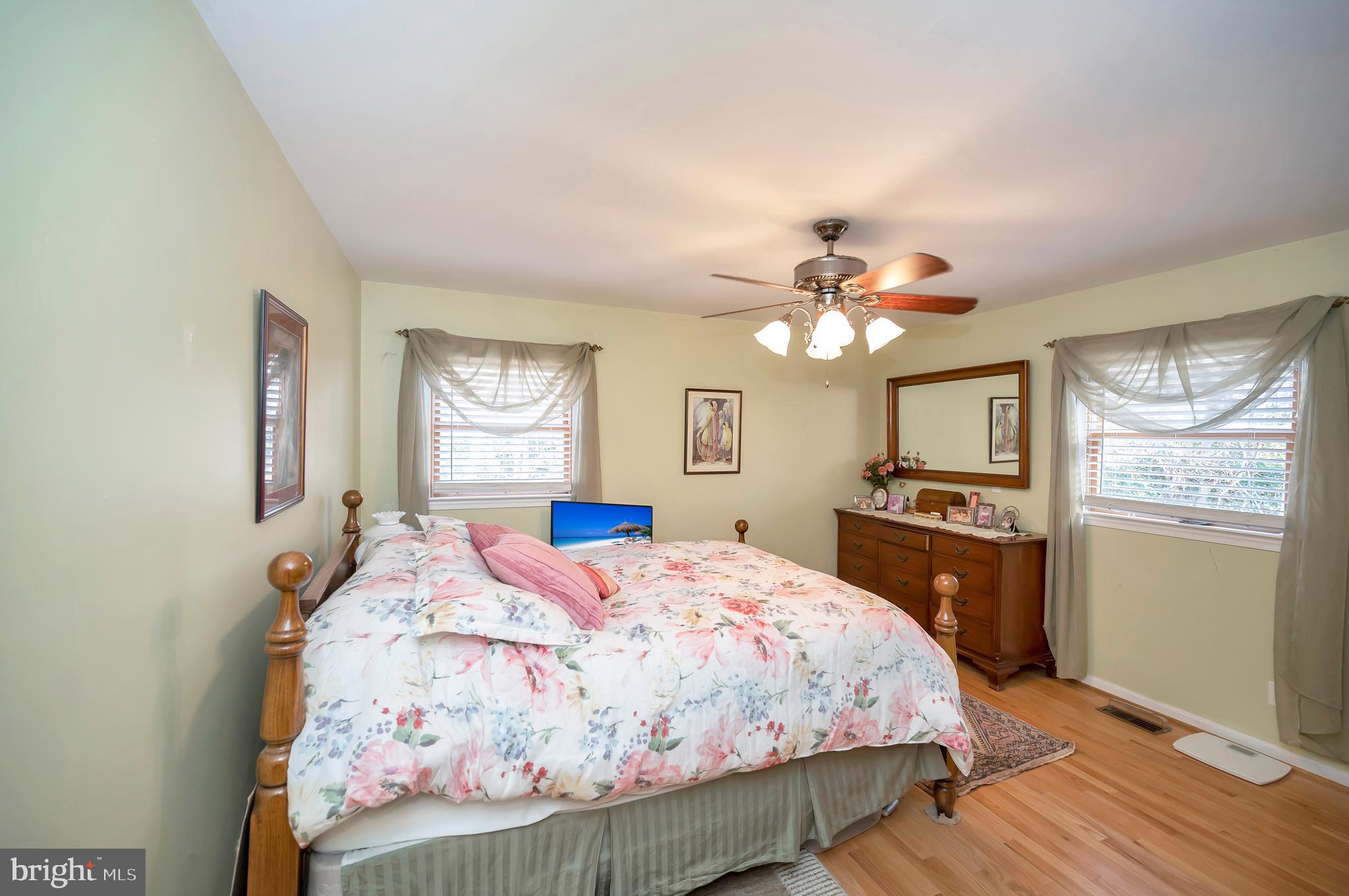 18 Winslow Road Fredericksburg, VA 22406 - Photo 28 of 49 a bedroom with a bed and a chandelier
