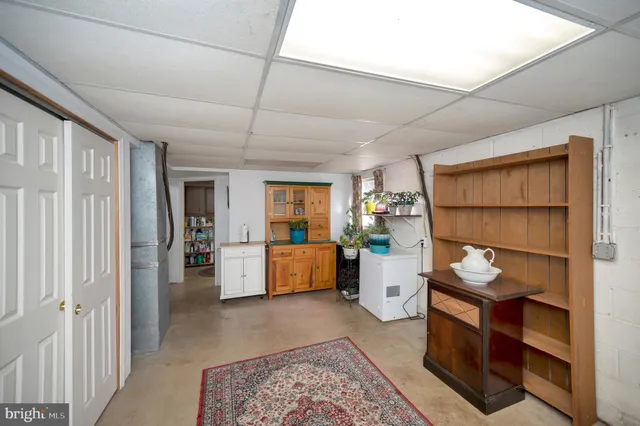 a room with furniture and a window