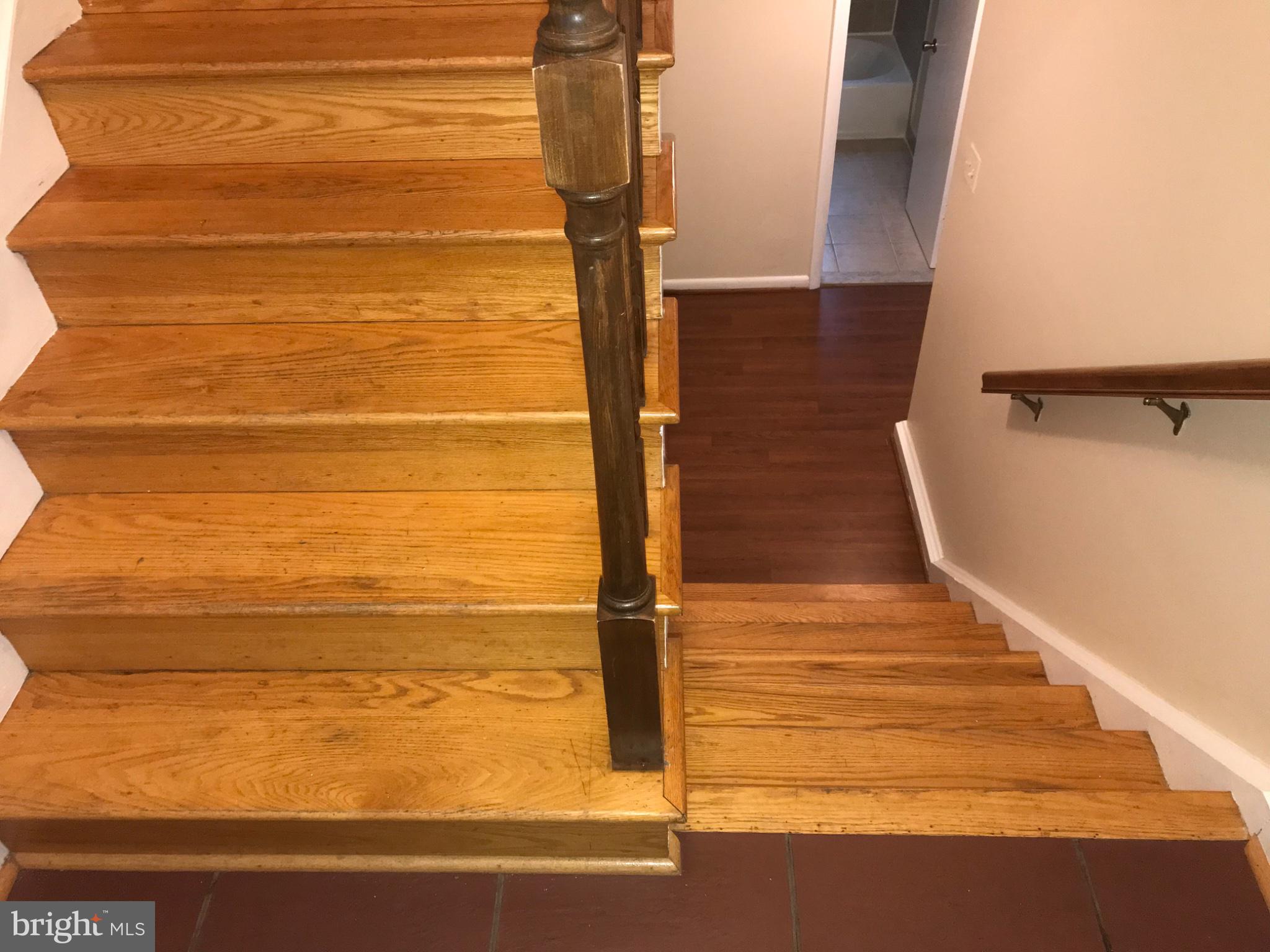 113 Kingsley Road Southwest Vienna, VA 22180 - Photo 38 of 40 Elegant wooden staircase design.