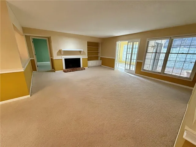 a view of a livingroom with a fireplace