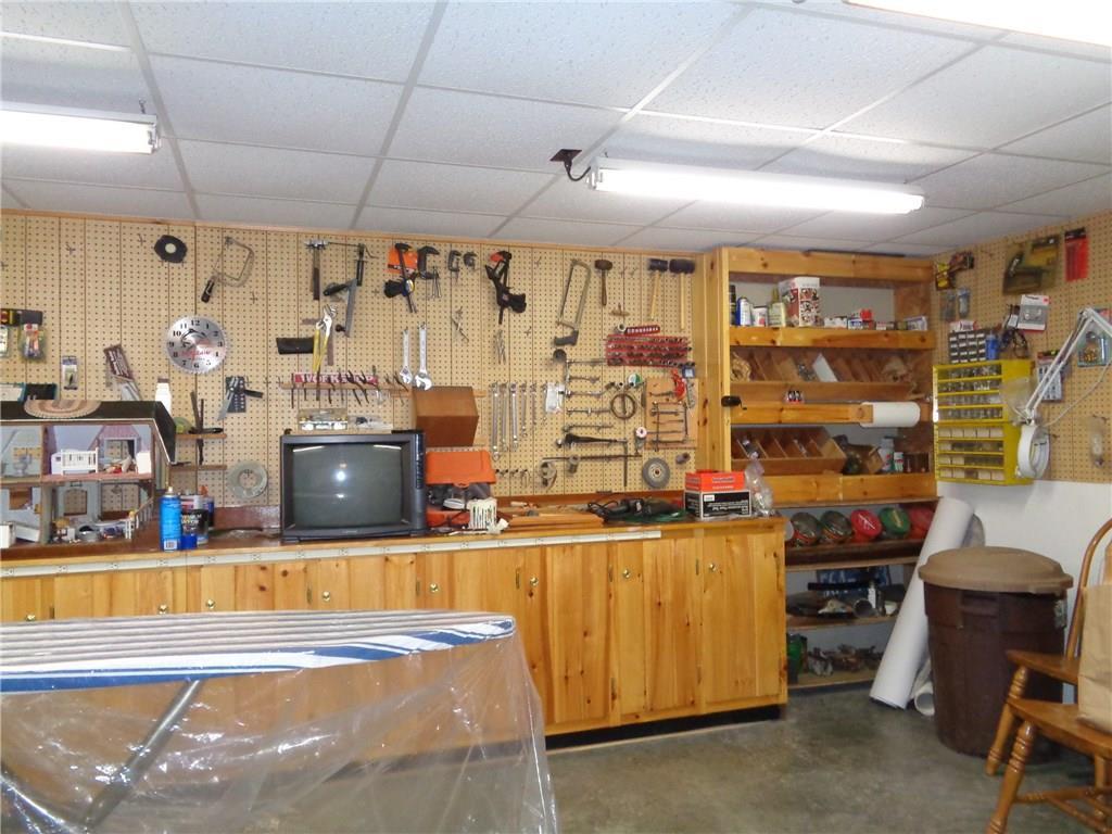 200 Cambridge Road Dexter, ME 04930 - Photo 15 of 19 Work shop in finished basement could...