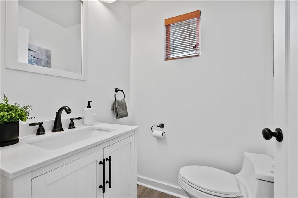 2923 Fernwald Road Pittsburgh, PA 15217 - Photo 13 of 36 a bathroom with a sink a toilet and shower