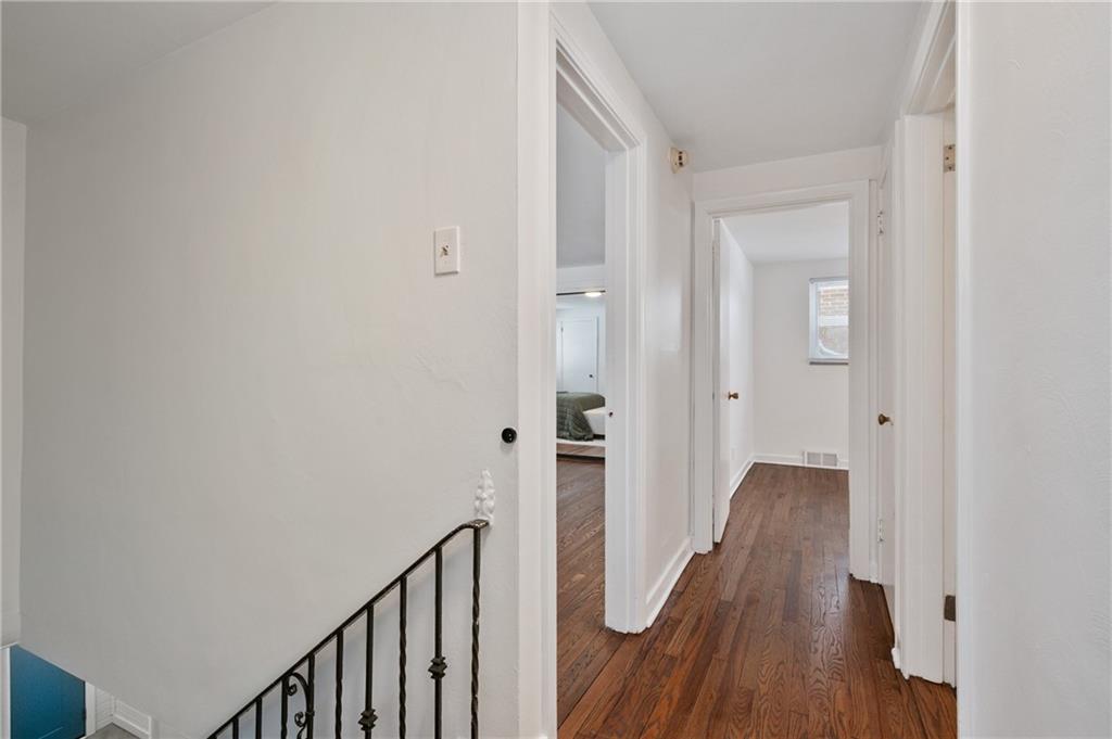2923 Fernwald Road Pittsburgh, PA 15217 - Photo 16 of 36 a view of a hallway with wooden floor