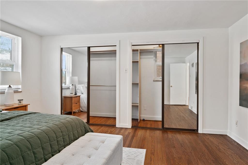 2923 Fernwald Road Pittsburgh, PA 15217 - Photo 18 of 36 a bedroom with a bed and a mirror