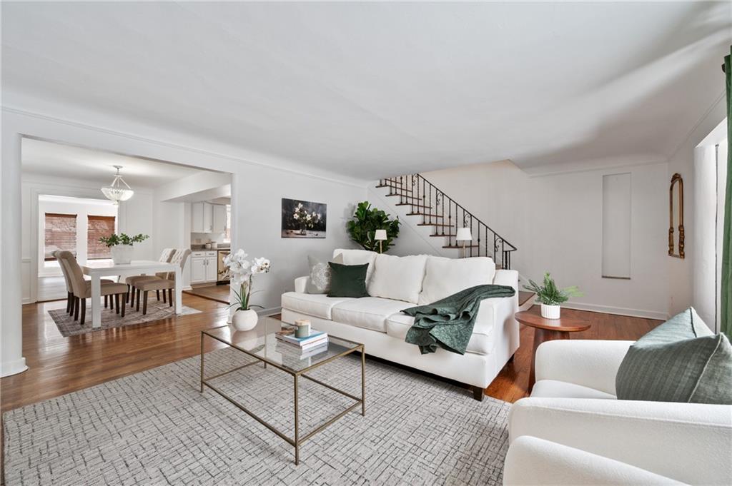 2923 Fernwald Road Pittsburgh, PA 15217 - Photo 2 of 36 a living room with furniture and wooden floor