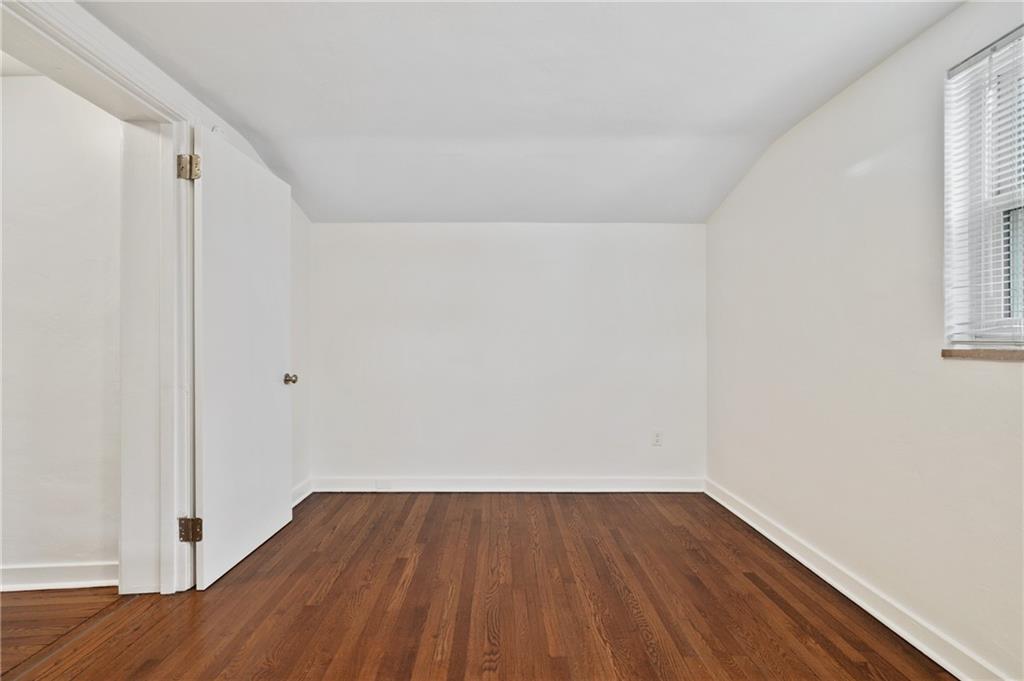 2923 Fernwald Road Pittsburgh, PA 15217 - Photo 23 of 36 a view of a room with wooden floor and window