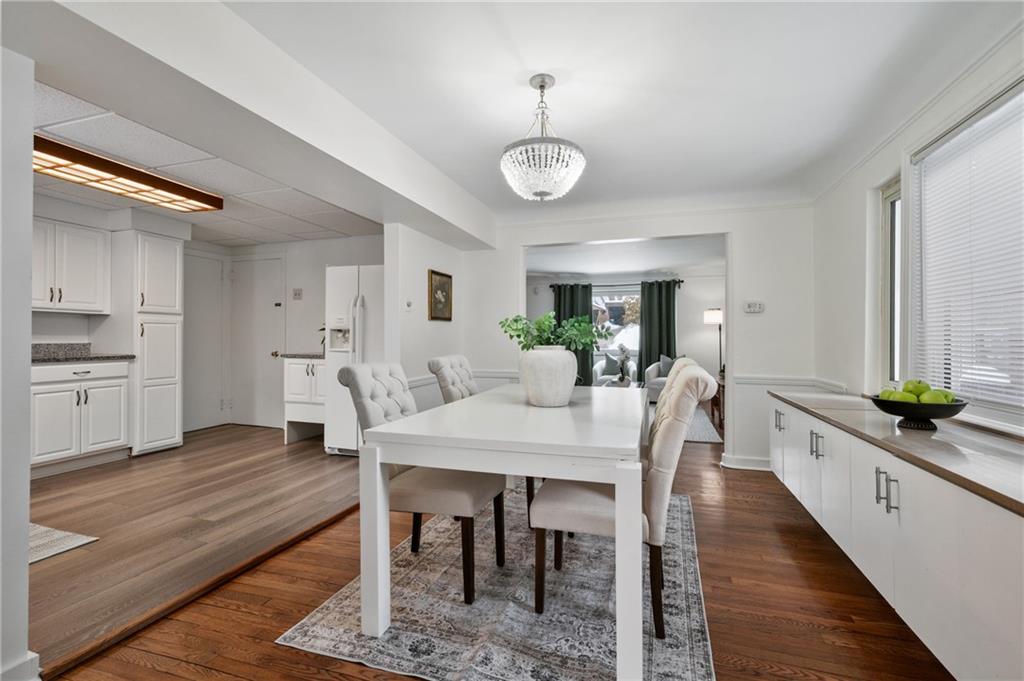 2923 Fernwald Road Pittsburgh, PA 15217 - Photo 6 of 36 a view of a dining room with furniture and wooden floor