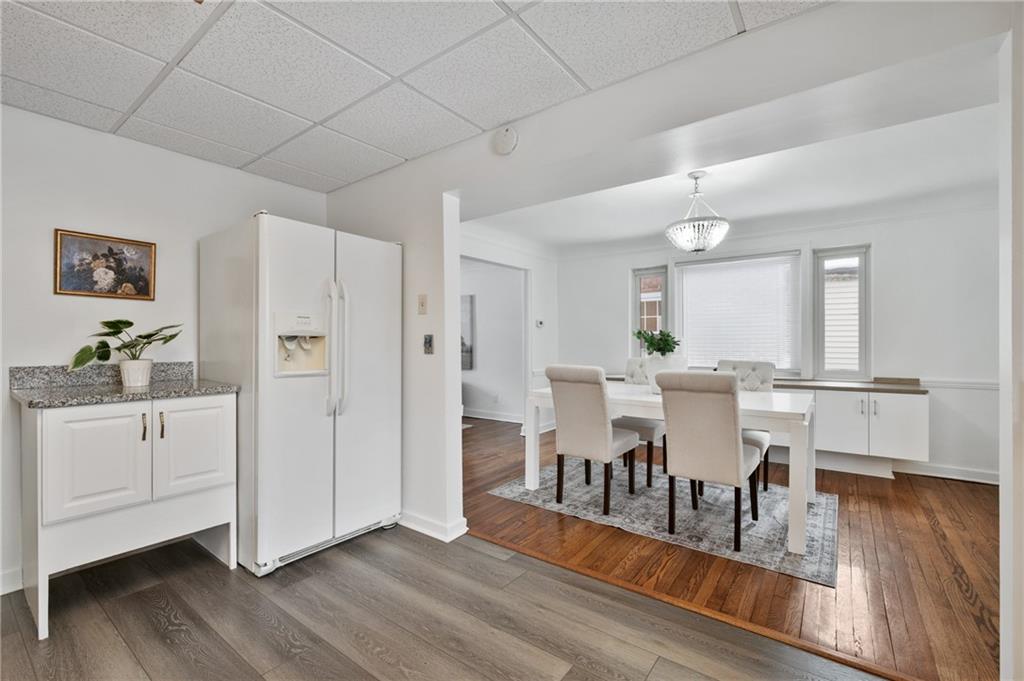 2923 Fernwald Road Pittsburgh, PA 15217 - Photo 10 of 36 a view of a dining room with furniture and wooden floor