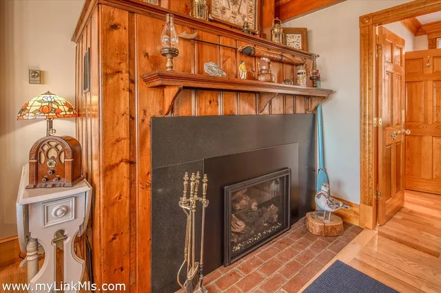 a front view of a house with barbeque oven