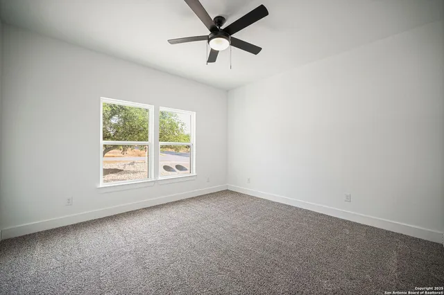 a view of an empty room with window