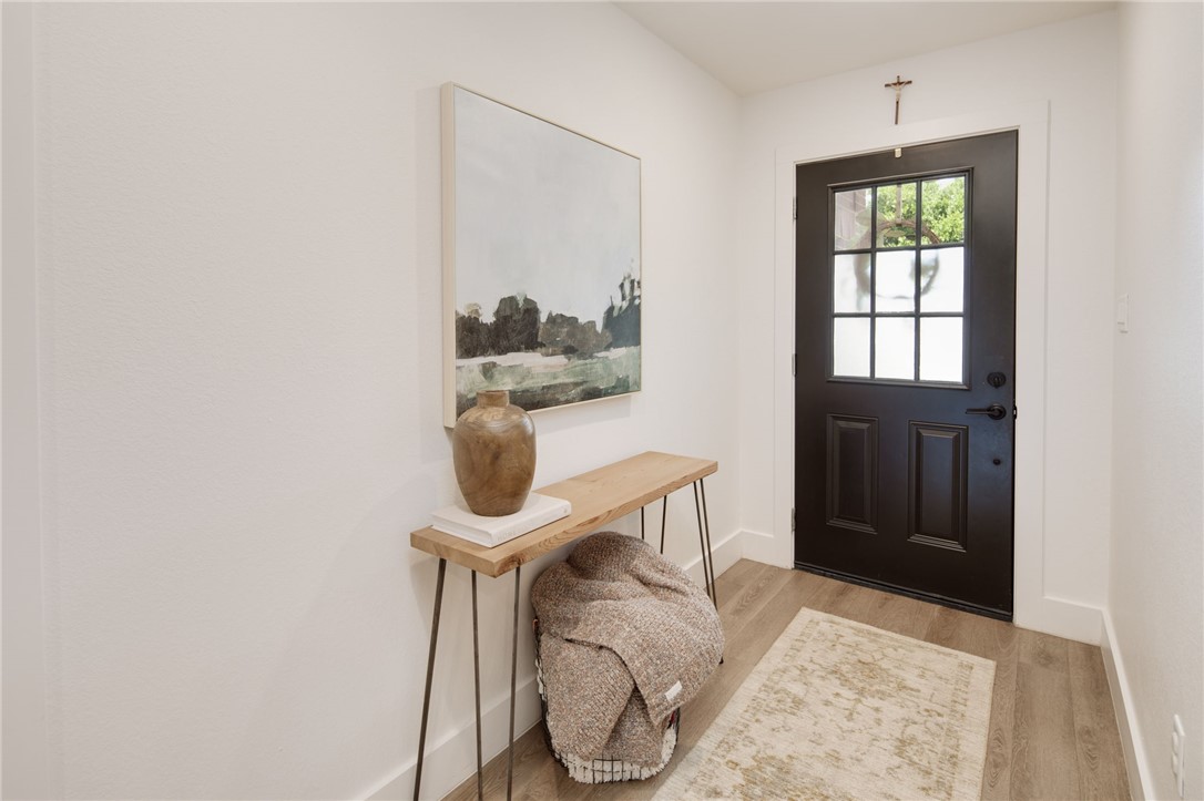 4700 Kensington Road Bryan, TX 77802 - Photo 5 of 31 Entryway featuring a black paneled door