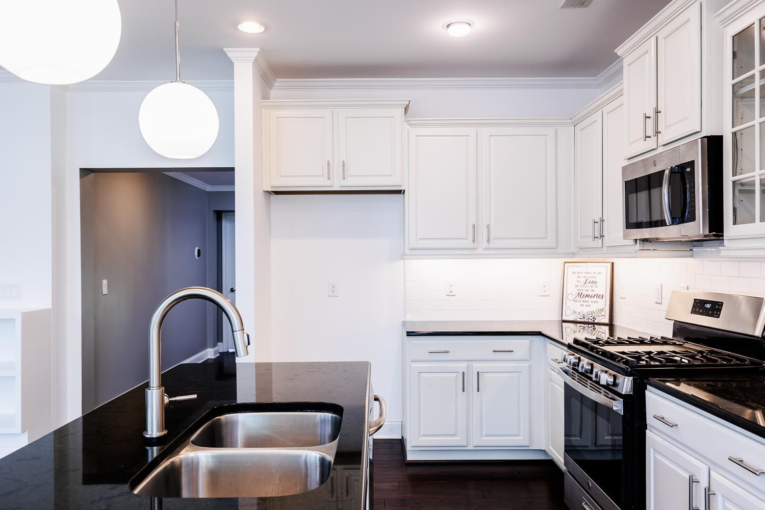 1581 Fullerton Place Raleigh, NC 27607 - Photo 5 of 42 On Trend Black/White Kitchen