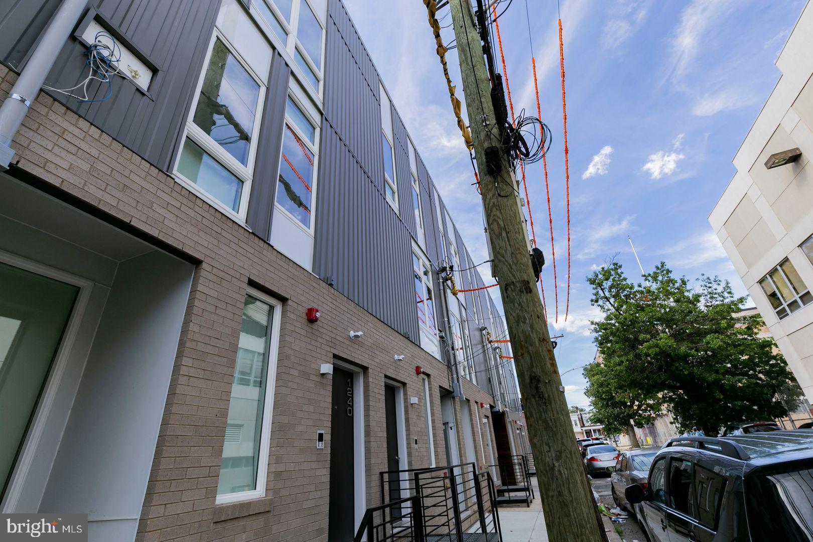 1242 LeCount Street, Unit B Philadelphia, PA 19121 - Photo 11 of 11 a view of balcony with wooden floor